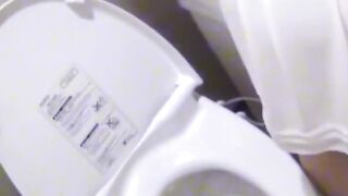 Hidden cam films two Japanese honeys masturbating in public