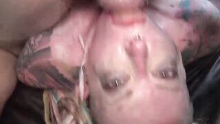 Tattooed slut Piggy Mouth deep throats like never before
