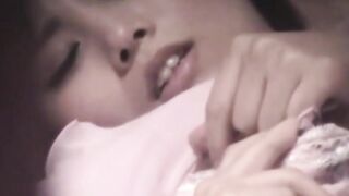 Horny Asian rubs shaved cunt while perv watches live