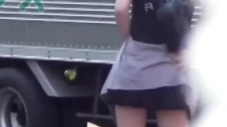 Voyeur films Asian women making puddles ina  public park