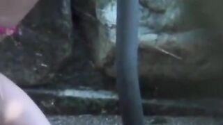 Voyeur films Asian women making puddles ina  public park