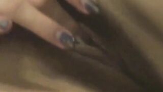Cute Asian babe's masturbation filmed by a horny voyeur