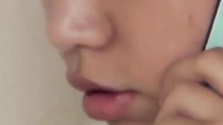 Cam films Asian babe testing toy through pantyhose at home