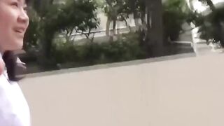 Adorable girl rushes to the park to find a spot to pee