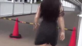 This girl seeks a spot to relief from her urge