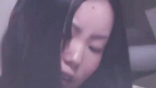 Petite Asian toys pussy to shaking orgasm on spycam couch