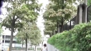 Her golden stream leaks through her panties in public corner