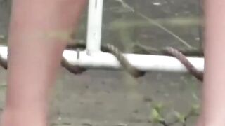 Voyeur spots babe peeing on stairs and flees in wet skirt