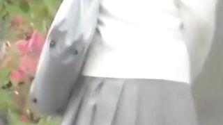 Japanese schoolgirl caught peeing in public by voyeur