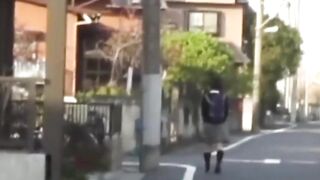 Japanese schoolgirl caught peeing in public by voyeur