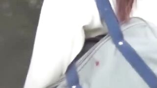 Japanese schoolgirl caught peeing in public by voyeur