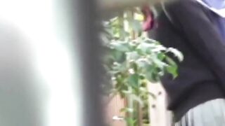 Japanese schoolgirl caught peeing in public by voyeur