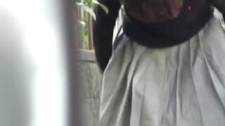 Japanese schoolgirl caught peeing in public by voyeur