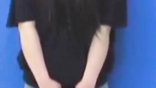 Brunette Japanese teen peeing pants after losing control