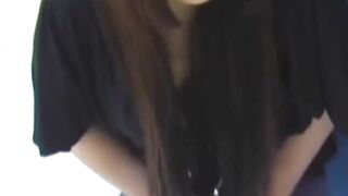 Brunette Japanese teen peeing pants after losing control