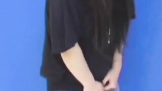 Brunette Japanese teen peeing pants after losing control