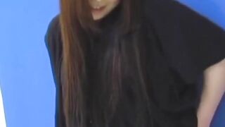 Brunette Japanese teen peeing pants after losing control