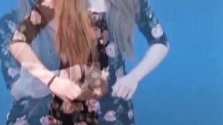Asian amateur girl peeing in shorts during solo photoshoot
