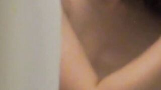 Voyeur captures Japanese girl in a heated moment at home