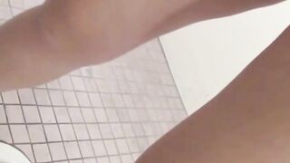 Watch Japanese women relieve themselves in a public toilet