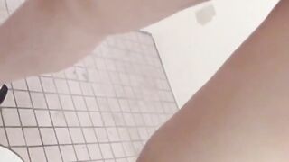Watch Japanese women relieve themselves in a public toilet