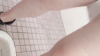 Hidden cam records Japanese women pissing in a restroom