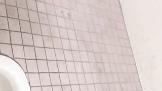 Hidden cam records Japanese women pissing in a restroom