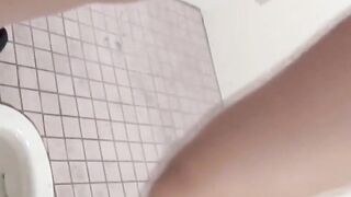 Hidden cam records Japanese women pissing in a restroom