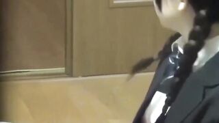 Japanese couple shares an intimate moment while watched