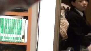 Japanese couple shares an intimate moment while watched