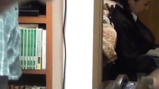 Japanese couple shares an intimate moment while watched
