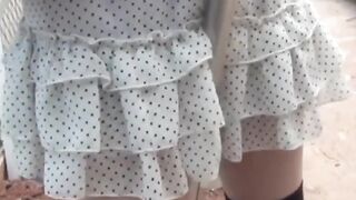 Adorable Asian girl rubbing hairy pussy outdoor
