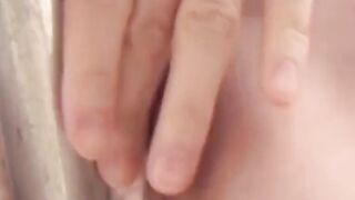 Adorable Asian girl rubbing hairy pussy outdoor