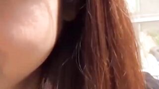 Adorable Asian girl rubbing hairy pussy outdoor