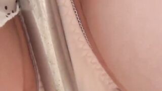 Adorable Asian girl rubbing hairy pussy outdoor