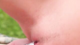 Sweet teen gal plays with a toy
