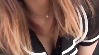 Lustful Japanese girl rubs her pussy around the park