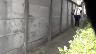 Street squatters pee in secluded alley and walk off wet