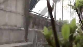Street squatters pee in secluded alley and walk off wet