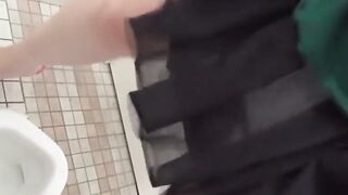Closeup of young Japanese girls enjoying their peeing moments