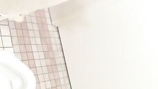 Closeup of young Japanese girls peeing in public toilet scenes