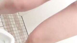 Closeup of young Japanese girls peeing in public toilet scenes