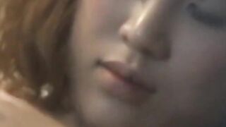 Japanese babe enjoys intimate moments while being watched