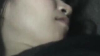 Japanese woman unknowing as she entertains herself on tape