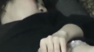 Japanese woman unknowing as she entertains herself on tape