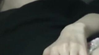 Japanese woman unknowing as she entertains herself on tape