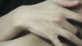 Japanese woman unknowing as she entertains herself on tape