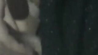 Japanese woman unknowing as she entertains herself on tape
