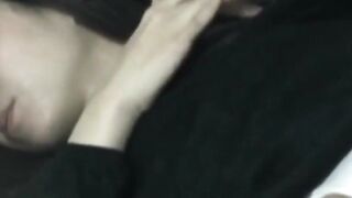 Japanese woman unknowing as she entertains herself on tape