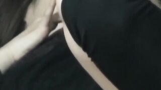 Japanese woman unknowing as she entertains herself on tape